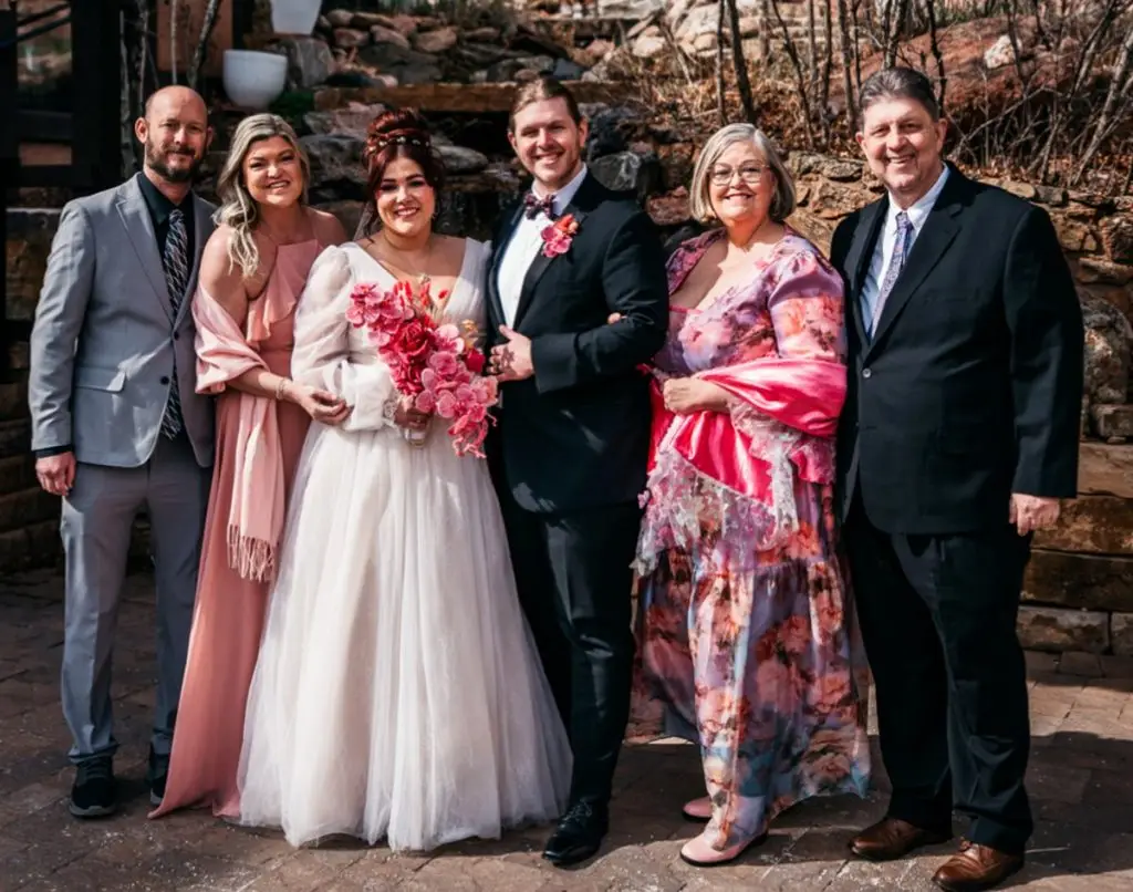 Bryan and Kendra Hofferber, Melanie and Nicholas Altemeyer, and Kim and Rick Altemeyer at Melanie and Nicholas’s wedding, Pikes Peak Colorado—celebrating Christian family life and legacy.